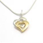 Double heart pendant in gold & silver