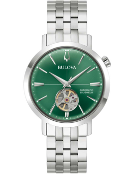 Bulova-klocka med grön urtavla, öppen mekanism, metallarmband. Text: "Automatic", "21 Jewels".