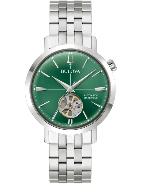 Bulova-klocka med grön urtavla, öppen mekanism, metallarmband. Text: "Automatic", "21 Jewels".
