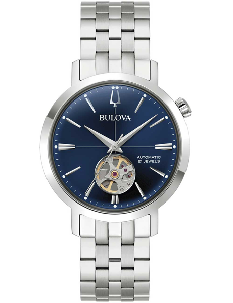 Blå urtavla med "Bulova", synlig mekanism, silverarmband, text "Automatic 21 Jewels".