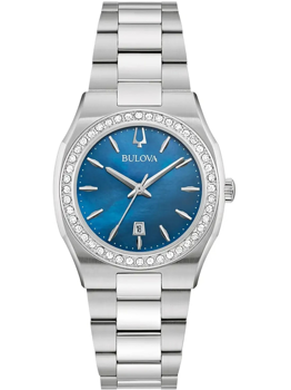 Klocka med blå urtavla, tydliga markeringar, stenprydd bezel och metallarmband.