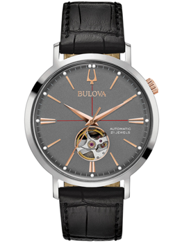 Svart armband, öppen urtavla med mekanism, text "Automatic 21 Jewels", Bulova-logga.
